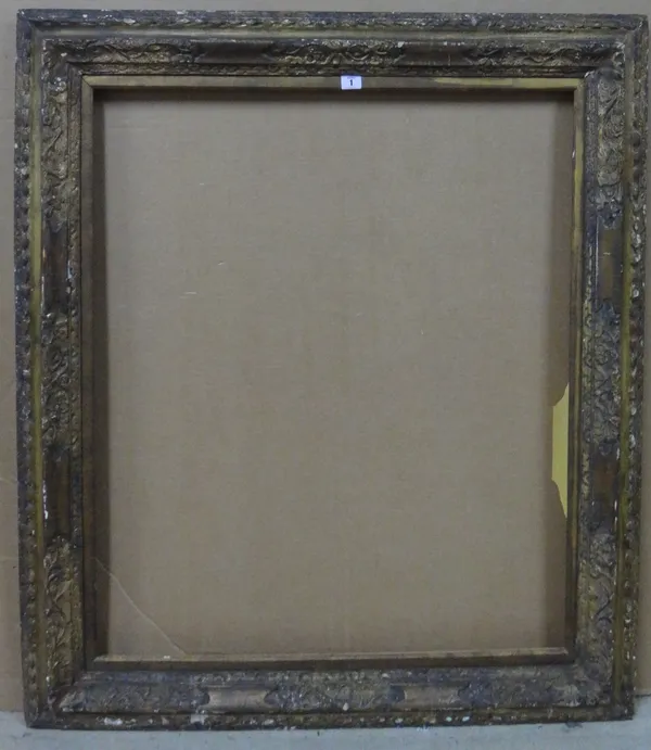 An 18th century style carved giltwood frame, with foliate decoration, the aperture 91.5cm x 76cm. CAB