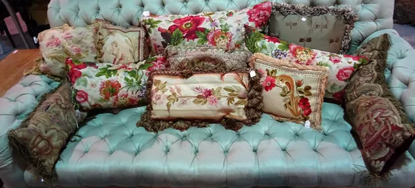 Cushions, including; three floral printed and six needlework examples and two others, (11).  D4