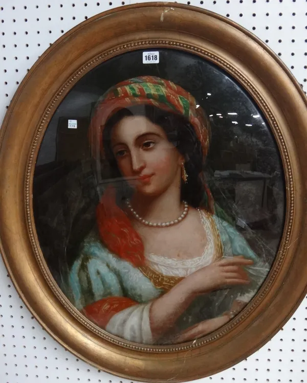 Continental School (late 19th century), Portrait of a girl in Turkish dress, oil on canvas, reverse laid on convex glass, oval, 63cm x 52cm.