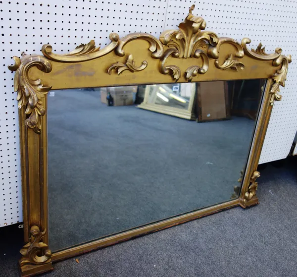 A Victorian gilt framed rectangular overmantel mirror with bold carved acanthus decoration, 149cm wide x 117cm high.