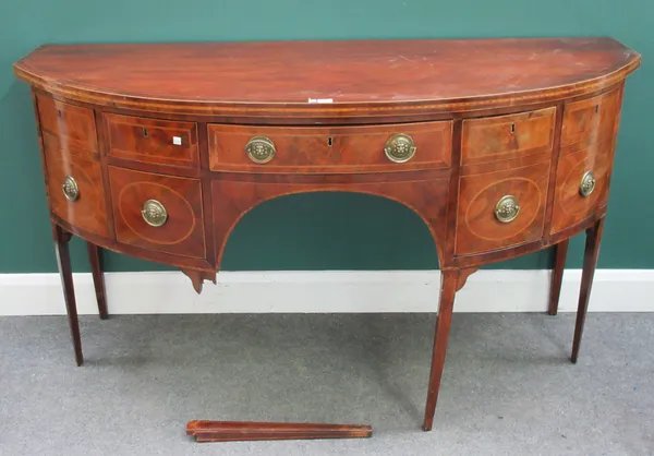 A George III mahogany semi elliptic sideboard with four frieze drawers flanked by cupboards on tapering square supports, (a.f) 163cm wide x 90cm high