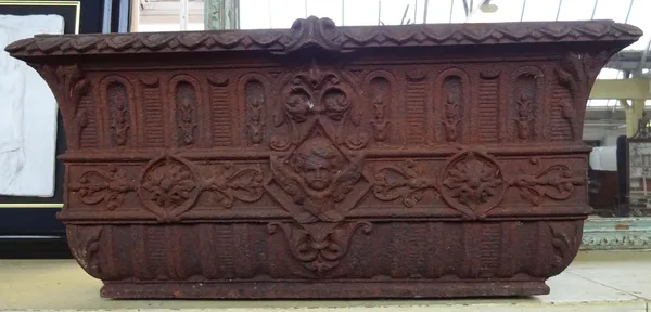 A Victorian rectangular cast iron planter, relief cast with floral tracery and cherub heads, 73cm wide x 30cm high x 33cm deep.