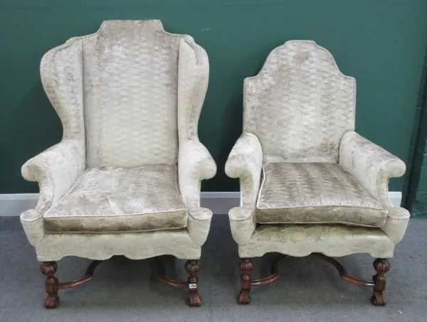 A near pair of late 17th century Flemish design easy armchairs, with arched back and rollover arms, on knurl feet, united by shaped 'X' frame stretche