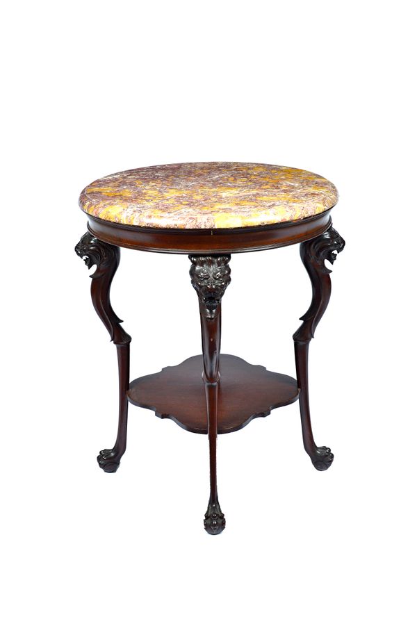 A 19th century Irish centre table, the circular marble top on a mahogany base, with four lion monopodia supports, united by platform undertier, 60cm d