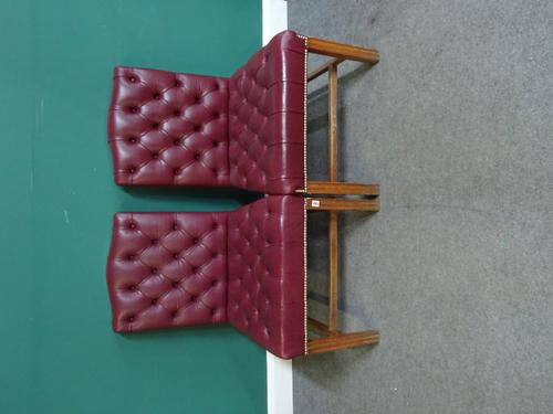 A set of five George III style brass studded rouge leather upholstered hump back side chairs, on channelled square supports, 60cm wide x 95cm high, (5