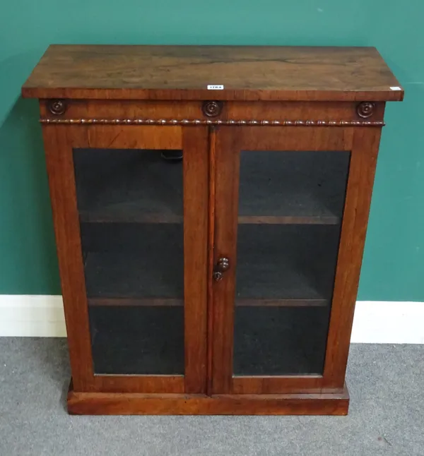 A 19th century rosewood glazed two door side cabinet, with faux bamboo decoration, 77cm wide x 92cm high x 31cm deep.