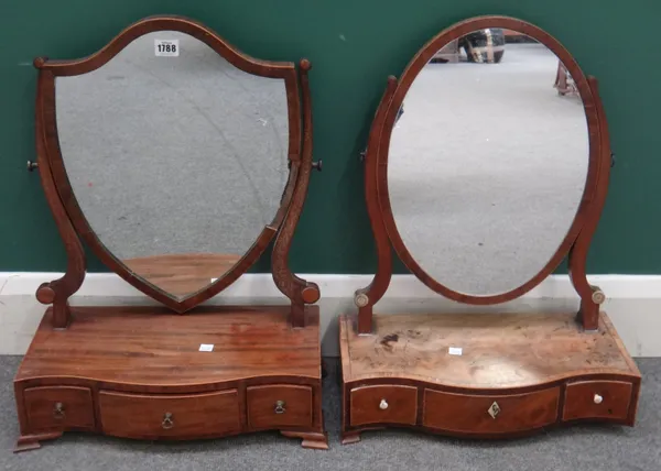 A George III mahogany swing framed toilet mirror, with serpentine three drawer base, 45cm wide x 58cm high, together with another similar, 42cm wide x