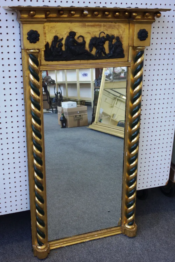 A 19th century gilt framed pier glass, with inverted ball mounted frieze and classical panel, over a rectangular plate flanked by spiral twist columns