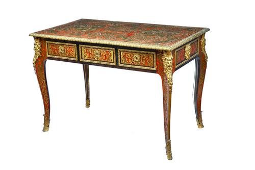 A Napoleon III boulle work writing table, the rectangular top over three frieze drawers and dummy opposing, on cabriole supports, 115cm wide x 80cm hi