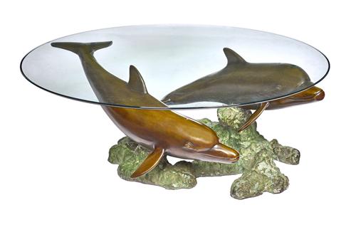 A. J. Rock; a 20th century coffee table, the circular glass top on a bronze base, cast as two dolphins, 127cm diameter x 45cm high, together with a fr