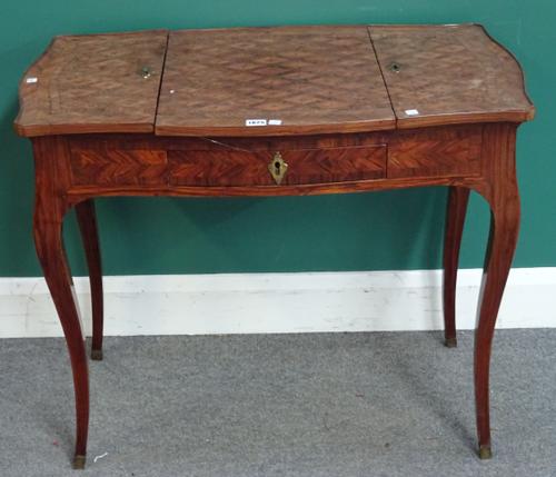 An 18th century French parquetry inlaid rosewood, kingwood and tulipwood dressing table, with lift top, on cabriole supports, 88cm wide x 72cm high x