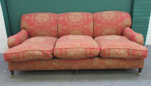 A George Smith style 20th century three seat sofa, with hump back on turned mahogany supports, 215cm wide x 80cm high.
