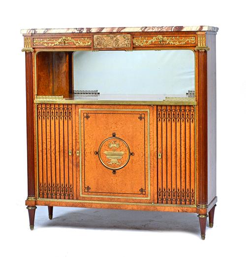 A late 19th century French gilt metal mounted figured walnut side cabinet, the marble top over a pair of frieze drawers, mirrored recess and three cup