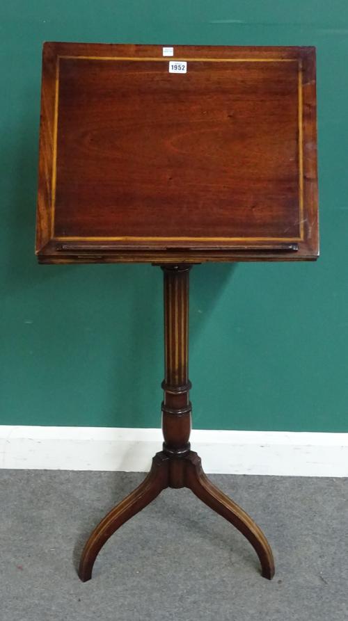 A 19th century inlaid mahogany reading stand, the height adjustable top on tripod base, 51cm wide.
