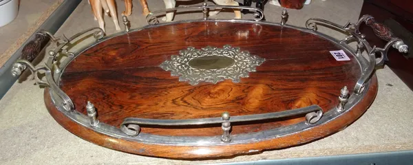 A 19th century oval rosewood and silver plated galleried tray.  S2