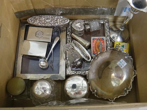 Mostly silver and silver mounted wares, comprising; two rectangular photograph frames, a vase, a shaped circular dish, a nail buffer, two rectangular