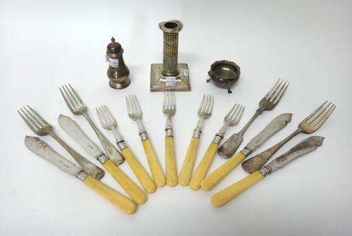 Silver and silver mounted wares, comprising; four fish knives and five fish forks, Sheffield 1937, a candlestick raised on a square base, a pepperette