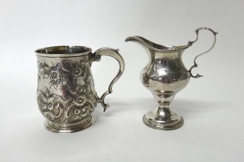 Silver, comprising; a George III cream jug, of baluster form, with a scrolling handle, with beaded rims, London 1778 and an early George III christeni