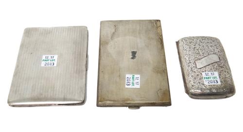 Two silver rectangular cigarette cases, with engine turned decoration, Birmingham 1930 and 1938 and another smaller cigarette case, with scroll engrav