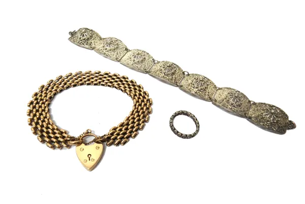 A gold decorated and plain oval link bracelet, on a 9ct gold heart shaped padlock clasp, Birmingham 1907, weight 21 gms, a filigree link bracelet and