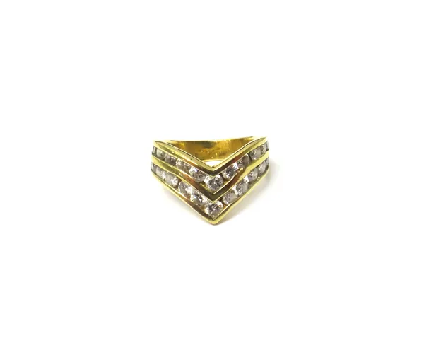 A gold and diamond set ring, in a wishbone 'V' shaped design, mounted with two rows of channel set circular cut diamonds, ring size E and a half.
