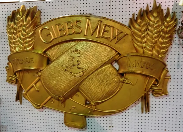 A large 'Gibbs Mew' gilt fibreglass sign. ROST