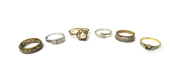 A gold and diamond set ring mount, (the central gemstone lacking), with rose diamond set three stone shoulders, four 9ct gold and colourless gem set r