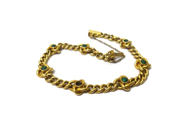 A gold and turquoise set curb link bracelet, mounted with turquoise at intervals within entwined settings, on a snap clasp, detailed 18, fitted with a