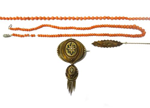 A Victorian gold and seed pearl set oval brooch, the centre with a seed pearl set starburst motif, otherwise with applied bead and wirework decoration