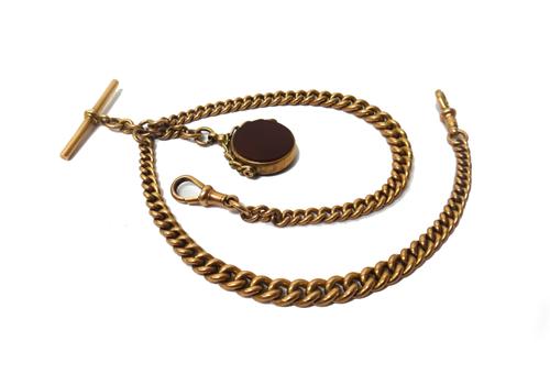 A gentleman's 9ct gold graduated curb link watch Albert chain, fitted with two 9ct gold swivels, a 9ct gold T bar and with a 9ct gold mounted bloodsto