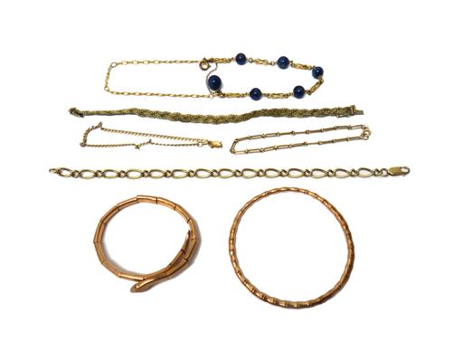 A 9ct gold bracelet, in a large and ropetwist small decorated curb link design, on a sprung hook shaped clasp, a 9ct gold bracelet, in a woven mesh li