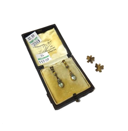 A pair of aquamarine and seed pearl pendant earrings, each mounted with an oval cut aquamarine to the drop and with three seed pearls above, the tops