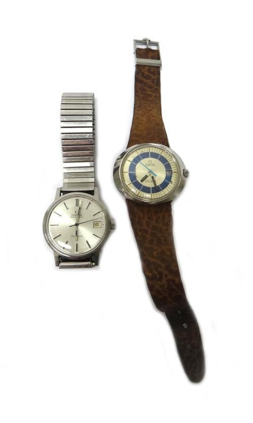 An Omega Dynamic Automatic oval steel cased gentleman's wristwatch, the signed silvered and blue dial with baton numerals, date of the month aperture