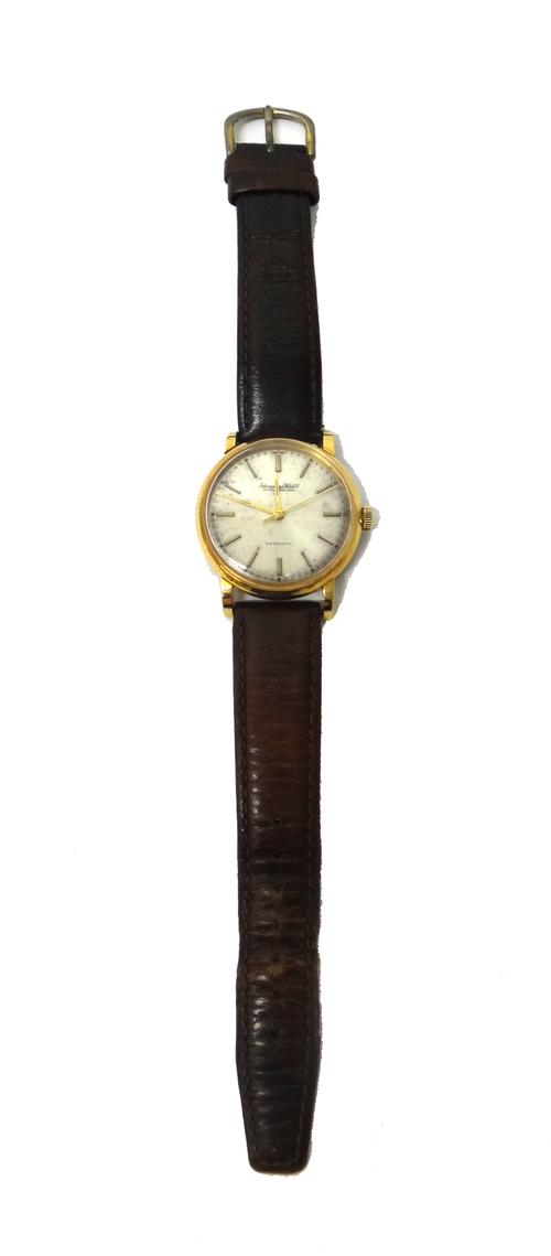 An International Watch Company gold circular cased gentleman's Automatic wristwatch, with a signed jewelled lever movement, numbered 1324252, the sign