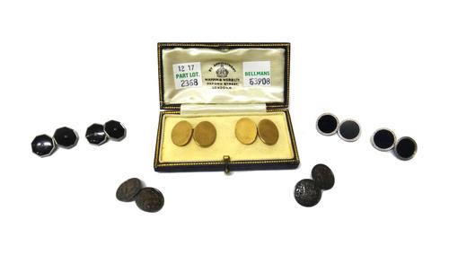 A pair of gold cufflinks with plain oval backs and fronts, detailed '9ct', weight 11.1 gms, with a case and three further pairs of cufflinks, (4).