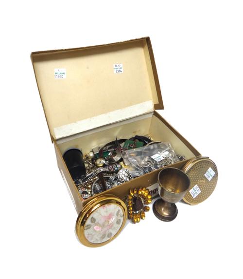 A silver curb link charm bracelet, fitted with a variety of silver and other charms, with a silver heart shaped padlock clasp, a quantity of mostly co