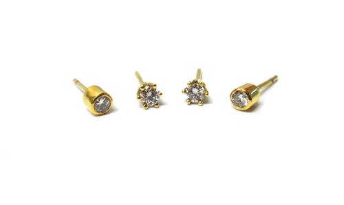 A pair of gold and diamond single stone earstuds, each claw set with a circular cut diamond, the backs with post fittings and a pair of gold and diamo