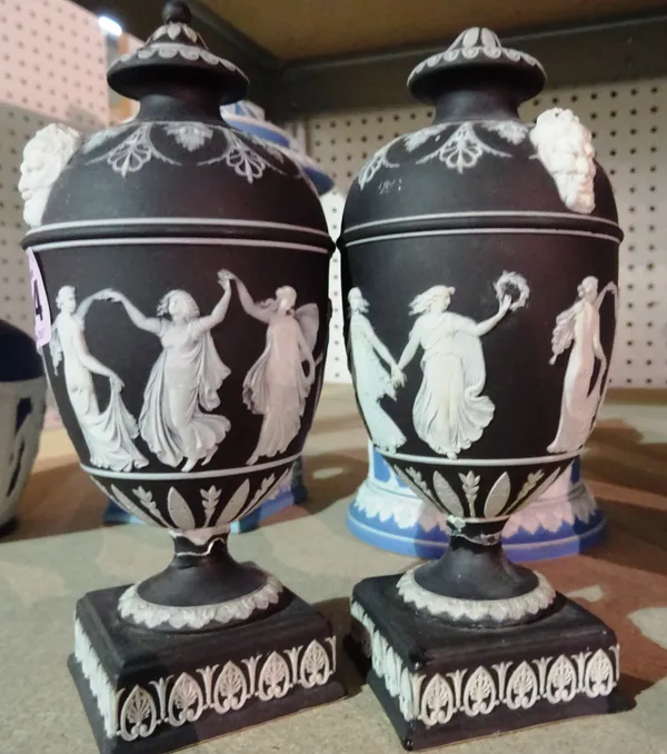 Wedgwood and Jasperware, including; a pair of black lidded vases, a pair of light blue twin handled vases and three further, (qty). S4