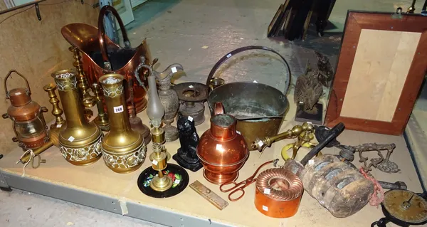 Collectables, including; two brass vases, a cast iron door stop, a copper helmet shaped fire bucket, brass candlesticks and sundry, (qty). S3