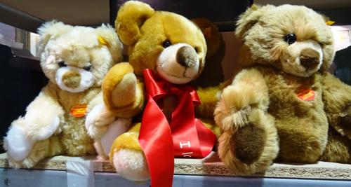 A Beswick bull, Leonardo and other modern porcelain animals, boxed, (7) and three modern Steiff Teddy bears, total (10).  S2