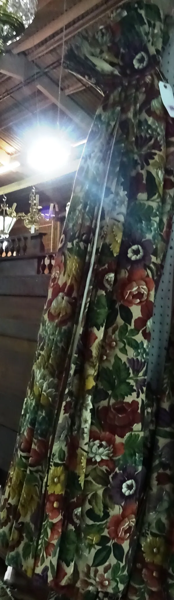 Curtains; two pairs of lined floral curtains, with beige ground and autumnal colour flowers, one pair approximately 100cm wide x 114cm drop, the secon