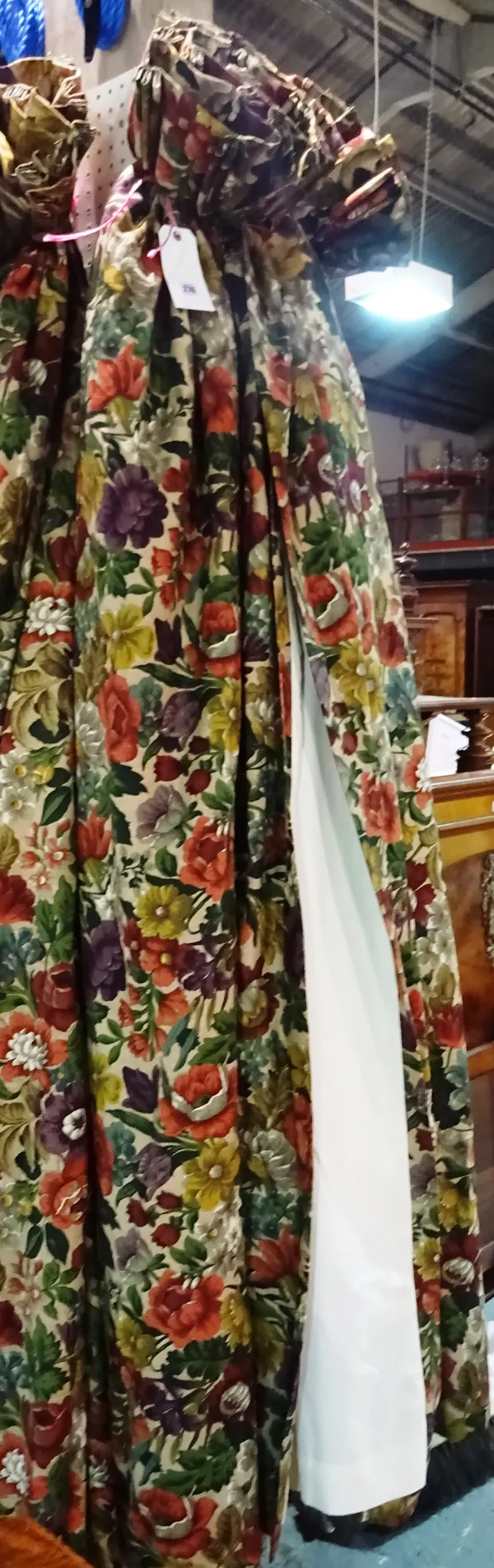 Curtains; two pairs of lined floral curtains, with beige ground and autumnal colour flowers, one pair approximately 130cm wide x 220cm drop, the secon
