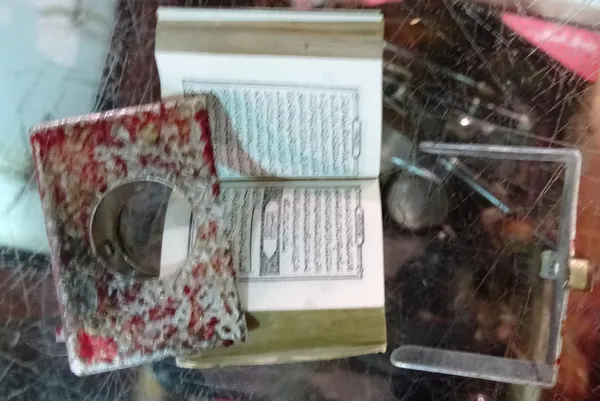 A 20th century miniature Qur'an. CAB