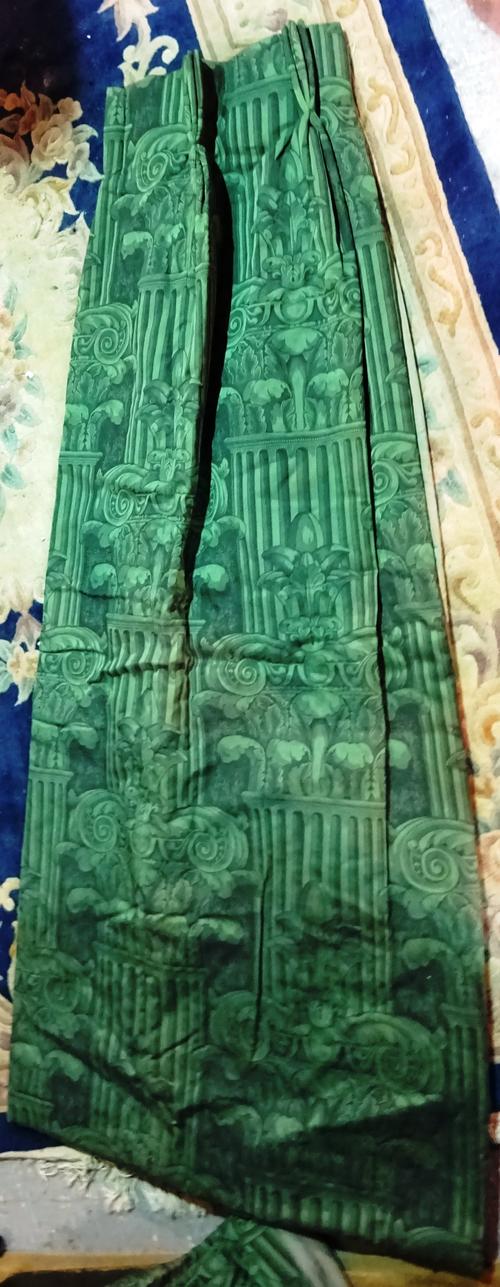 Curtains; A group of five lined and interlined dark green pattern curtains, in faded worn condition. (a.f) HANG