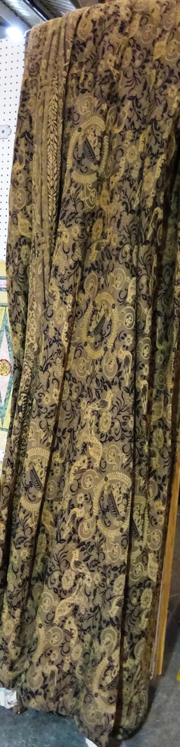 Curtains; Three individual lined and interlined beige ground with flora and fauna design, approximately 180cm wide x 325cm drop, (a.f) (3).  HANG