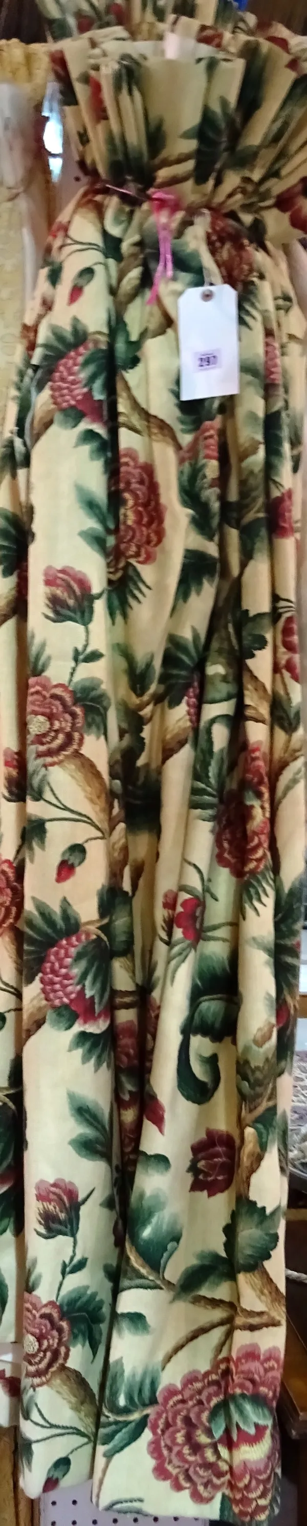 Curtains; A pair of lined and interlined yellow ground with red and green floral decoration, each approximately 140cm x 145cm drop. (2)  HANG