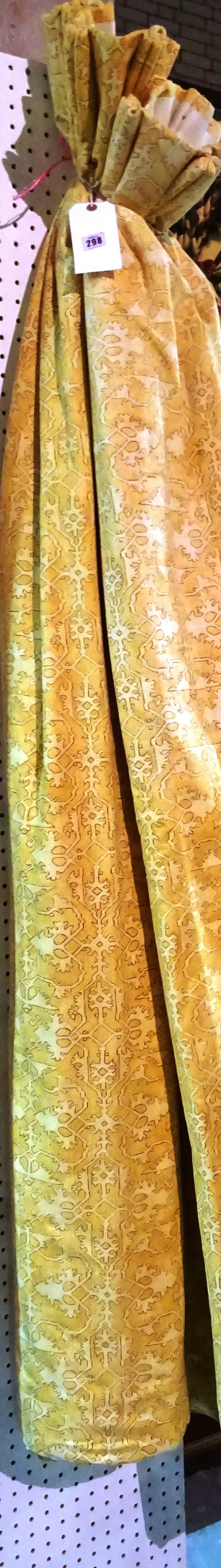 Curtains; A pair of lined and interlined yellow patterned curtains, 75cm wide x 190cm drop. (2) HANG