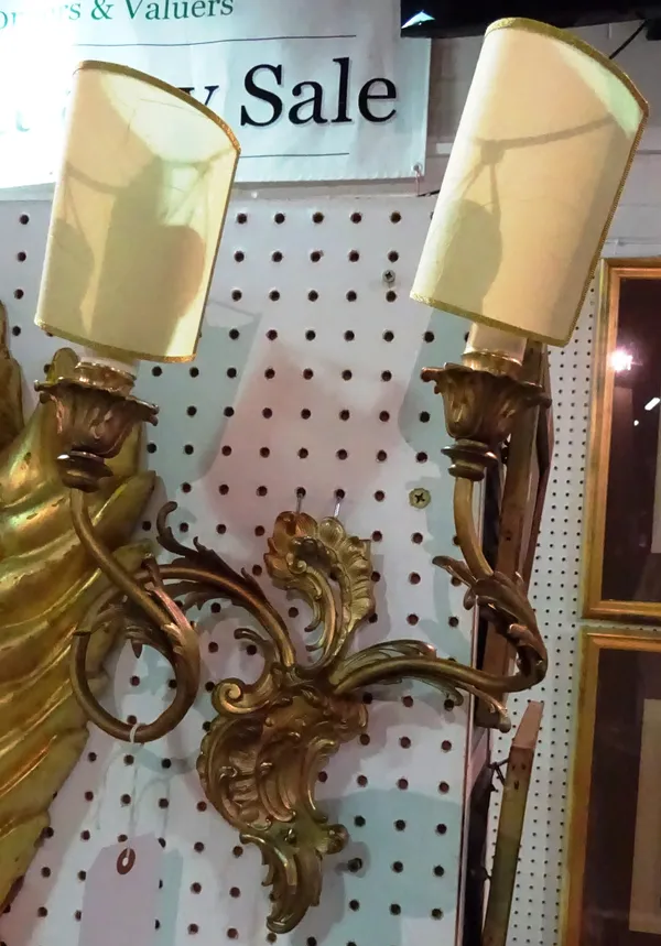 A pair of 20th century Rococo style twin branch wall sconces. (2)  ROST
