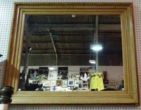 A 20th century rectangular pine mirror, 130cm wide x 106cm high. J10