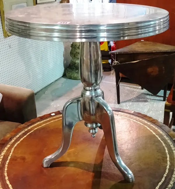 A 20th century chrome tripod table, 55cm wide x 61cm high. B7